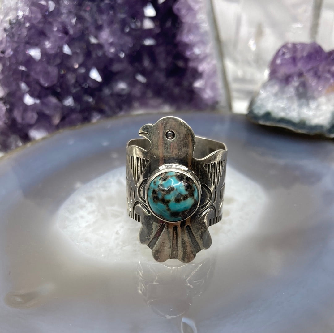Sterling silver thunderbird turquoise ring