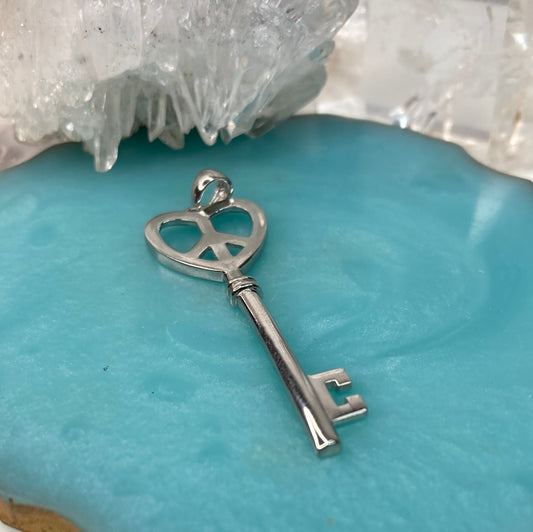 Sterling silver peace key pendant